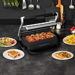 Grătar electric OptiGrill+ XL Snacking & Baking GC724D12, 9 programe, indicator nivel gătire, mod manual 4 nivele, plăci antiaderente din aluminiu turnat, tavă colectare lichide, tavă gustare și coacere, argintiu