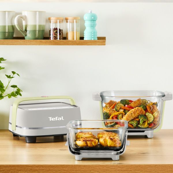 Friteuza cu aer cald portabila Tefal Crisp&Go FB701AE0, 1700 W, air fryer cu recipient din sticla, capac inteligent Power Lid, 4 moduri de gatire, cablu detasabil, crem Friteuza cu aer cald portabila Tefal Crisp&Go FB701AE0, 1700 W, air fryer cu recipient din sticla, capac inteligent Power Lid, 4 moduri de gatire, cablu detasabil, crem