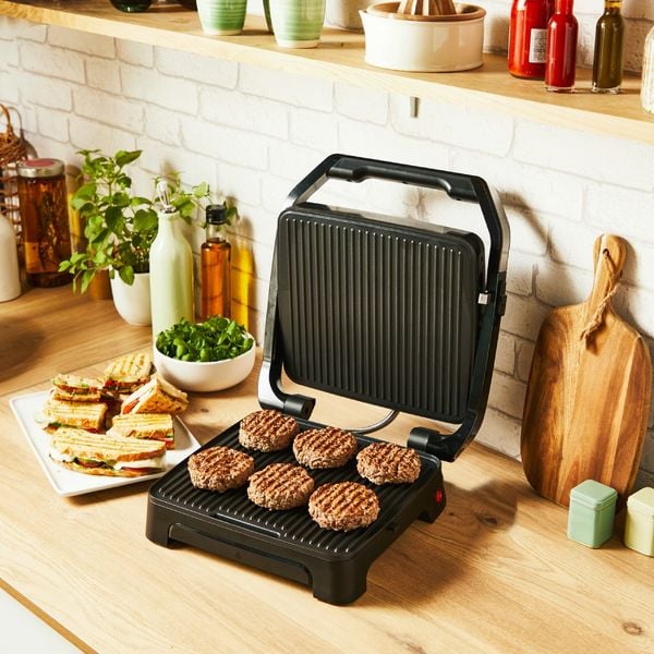 Gratar electric Tefal Inicio 2 in 1 GC271D10, 2000 W, pentru panini si grill, suprafata gatire 29 x 26 cm, pana la 6 portii, placi antiaderente, tava detasabila pentru suc, depozitare verticala, inox & negru