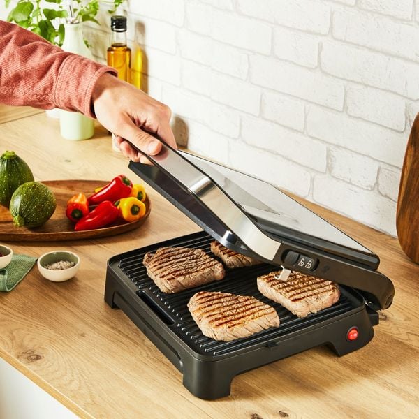 Gratar electric Tefal Inicio 2 in 1 GC271D10, 2000 W, pentru panini si grill, suprafata gatire 29 x 26 cm, pana la 6 portii, placi antiaderente, tava detasabila pentru suc, depozitare verticala, inox & negru