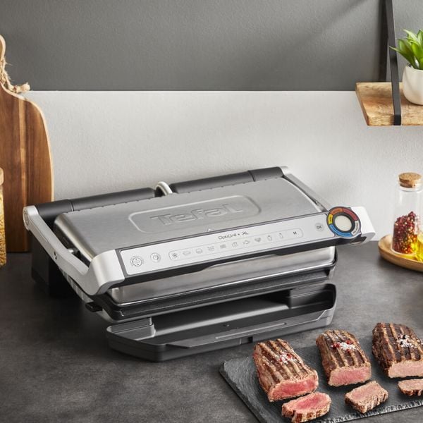 Grătar electric Tefal OptiGrill+ XL GC727D10, 2000W, 9 programe automate, plăci antiaderente 40x20 cm detașabile, tăviță pentru colectare, mod auto și manual, argintiu Grătar electric Tefal OptiGrill+ XL GC727D10, 2000W, 9 programe automate, plăci antiaderente 40x20 cm detașabile, tăviță pentru colectare, mod auto și manual, argintiu